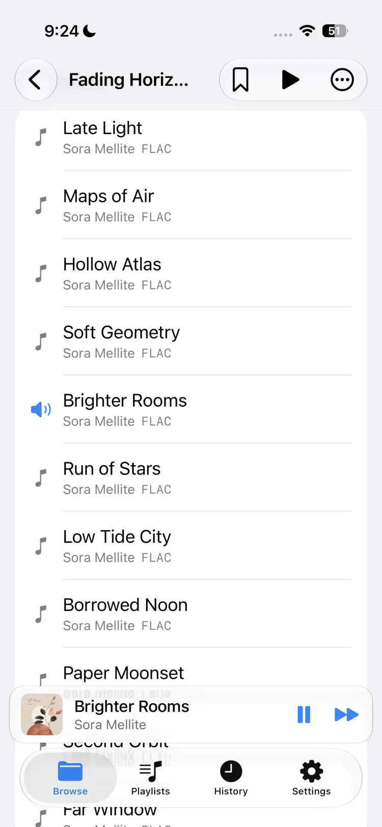 Nyquist on iPhone browsing an album track list with a pinned mini player and tab bar.